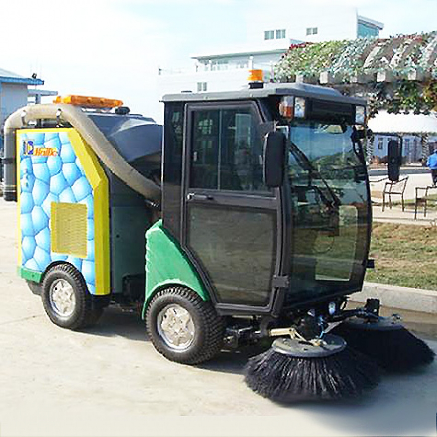 Sidewalk sweeper